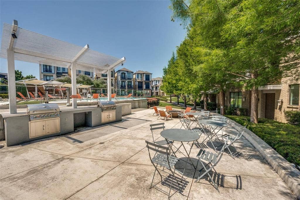 Outdoor grilling accommodations and firepit make this community space a wonderful place to gather.  A dog park is also located on the grounds!