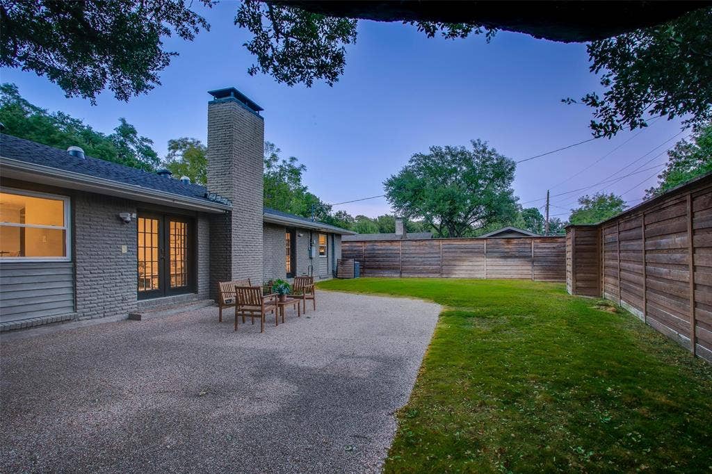 3918 Royal Palms Court, Dallas, TX 75244 Generous backyard combines open lawn, entertaining space and privacy.