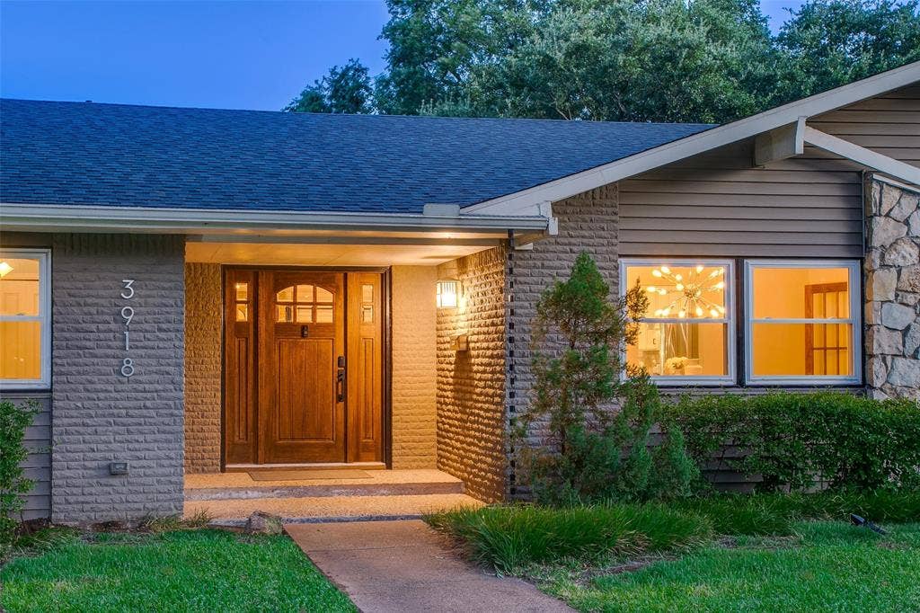 3918 Royal Palms Court, Dallas, TX 75244 Welcoming front entry preserves the home's Mid-Century character.