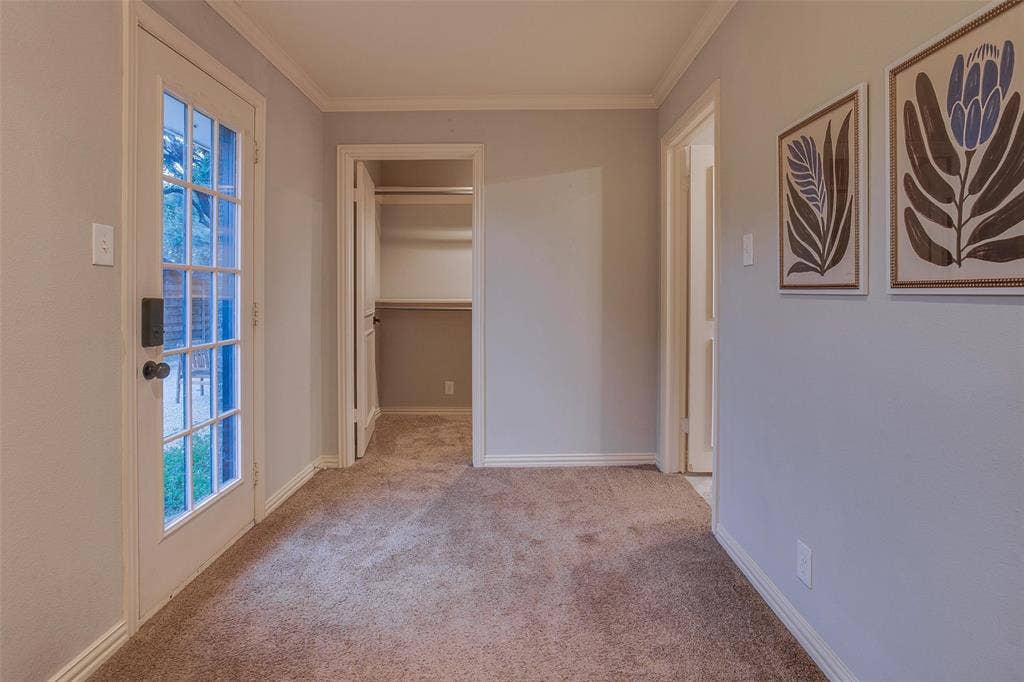 3918 Royal Palms Court, Dallas, TX 75244 Versatile space between the Primary Bedroom and one of two walk-in closets...ideal for a desk, dresser or sitting area.