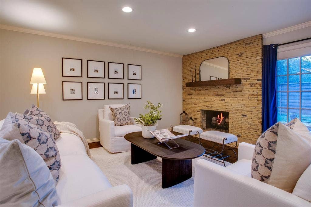 3918 Royal Palms Court, Dallas, TX 75244 Main Living Room anchored by the home's original stone fireplace wall.