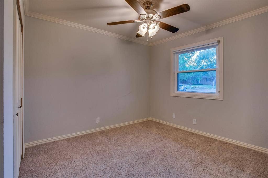 3918 Royal Palms Court, Dallas, TX 75244 Bedroom 4 completes the home's four-bedroom layout.