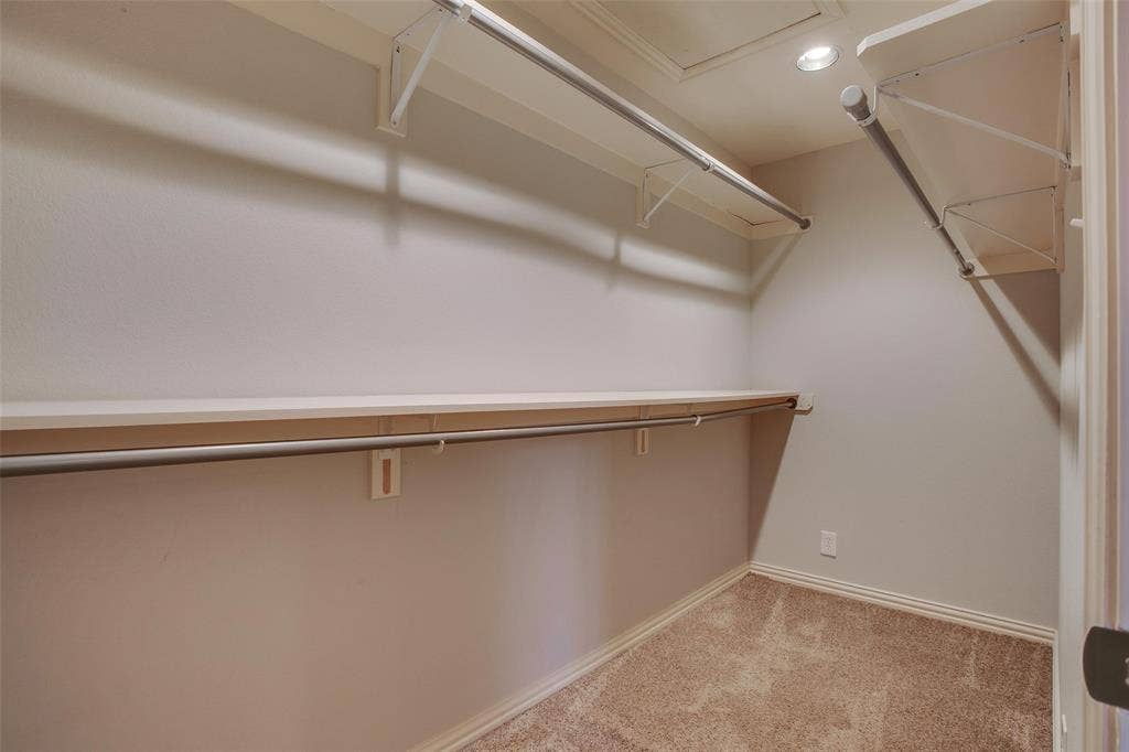 3918 Royal Palms Court, Dallas, TX 75244 One of two walk-in closets within the Primary Suite.