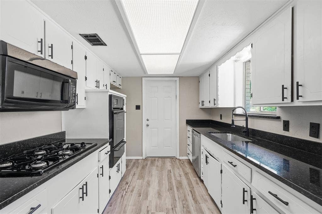439 Shorewood Drive, Duncanville, TX 75116 Galley style kitchen opens to den