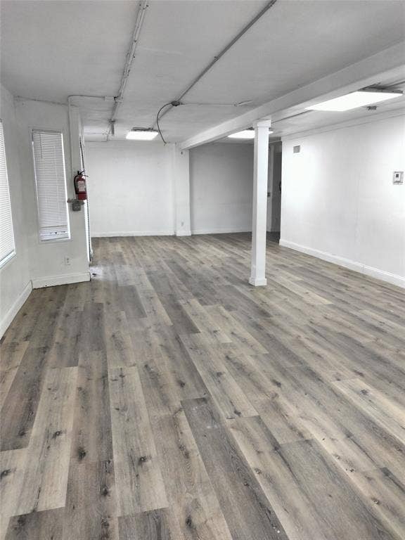 513 N 4th Street, Princeton, TX 75407 Expansive room featuring light wood-finish flooring and white walls