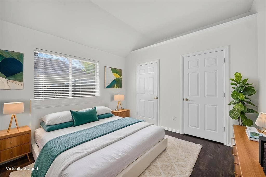1102 Hartman Court, Arlington, TX 76006 Vaulted ceiling, recessed window with blinds, dark wood-finish flooring, and white paneled doors