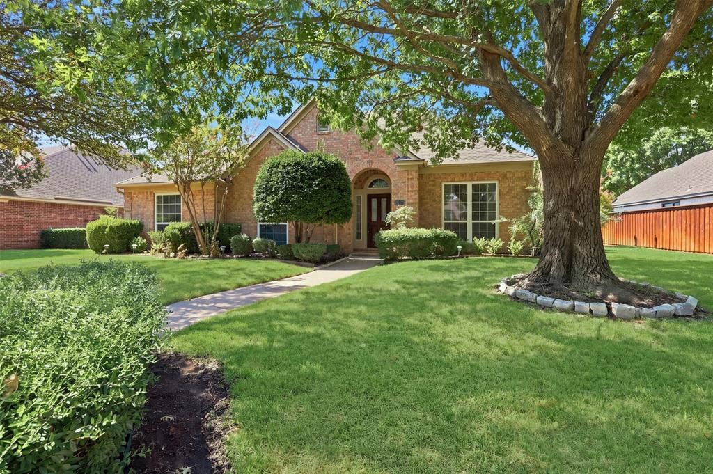 3617 Mackenzie Lane, Richardson, TX 75082 Lush St Augustine grass and landscaped yard with mature trees welcome you home at the end of a long day!