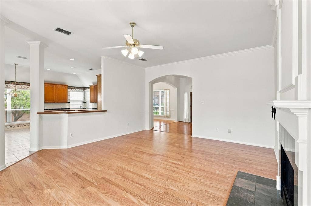 3617 Mackenzie Lane, Richardson, TX 75082 Kitchen flows to living area and dining room making the space feel large and airy.