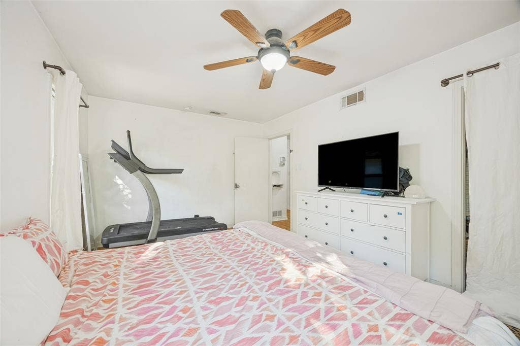 559 Blanning Drive, Dallas, TX 75218 Ceiling fan with wood-finish blades