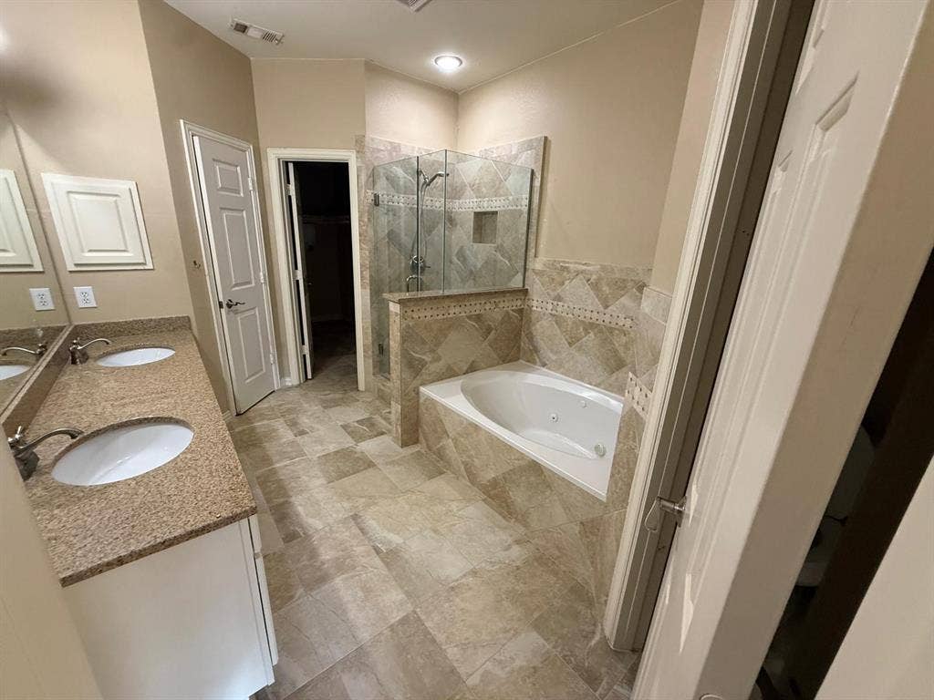 10012 Castlewood Drive, Plano, TX 75025 Dual vanity with undermount sinks and stone countertops