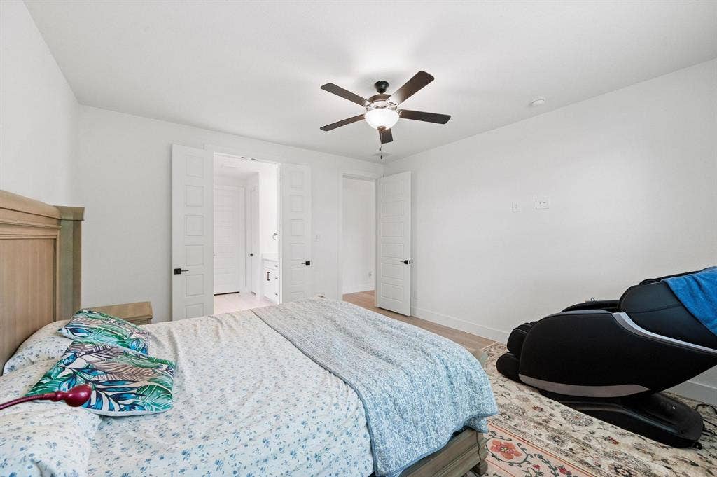 White walls and light wood-finish flooring
