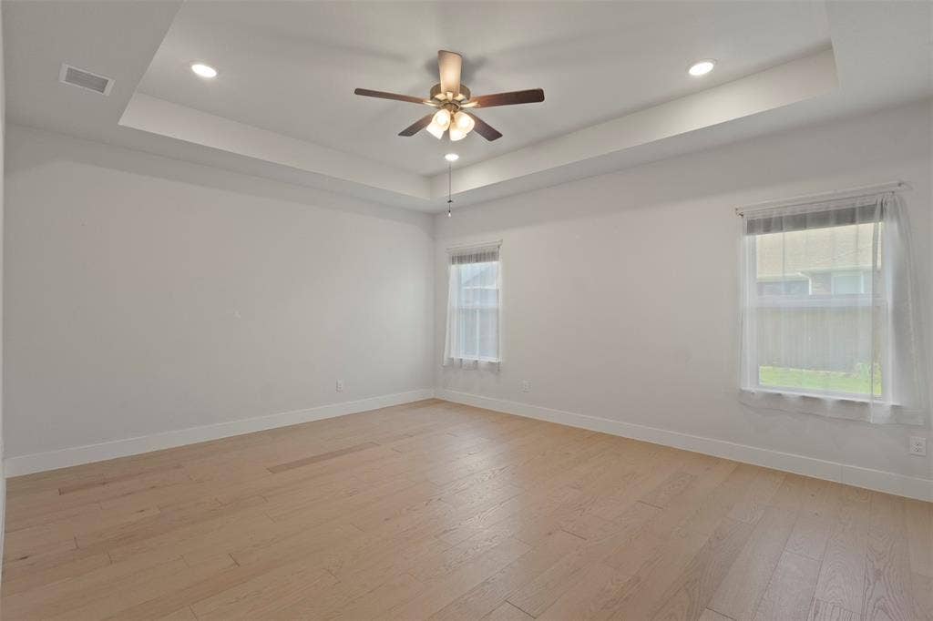 3905 Henley Lane, Garland, TX 75043 Primary Bedroom - tray ceiling and ceiling fan