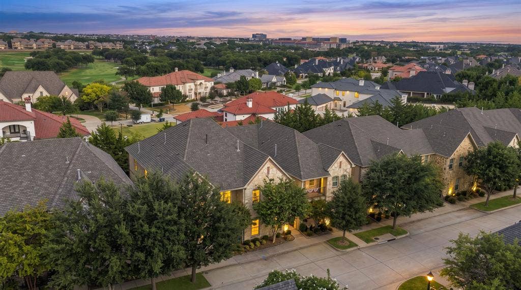 5605 Cojimar Drive, McKinney, TX 75070 Stone and brick exterior residences with gabled roofs and mature landscaping