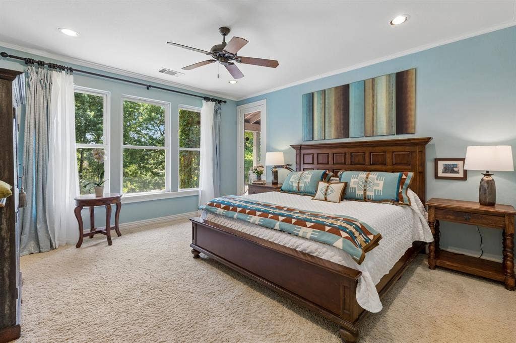 3227 Berry Hollow, Melissa, TX 75454 Primary bedroom overlooks scenic backyard, door leading to the large covered patio