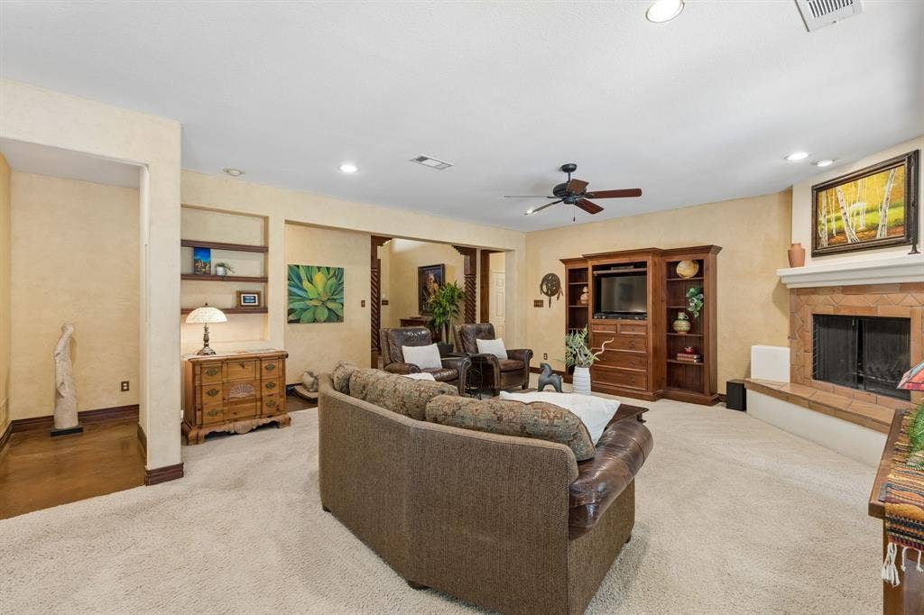 3227 Berry Hollow, Melissa, TX 75454 Living room is just off the entry and hallway leads to 3 downstairs bedrooms