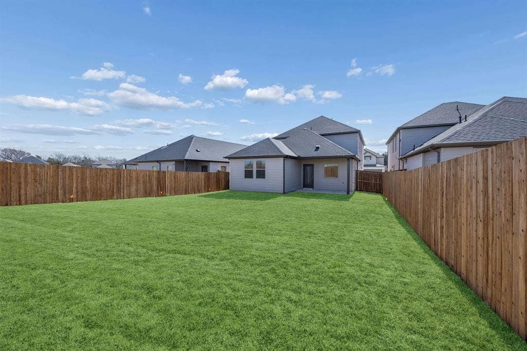 2709 Delevan Drive, Princeton, TX 75407 Covered Patio in the Oak II home plan by Trophy Signature Homes – REPRESENTATIVE PHOTO