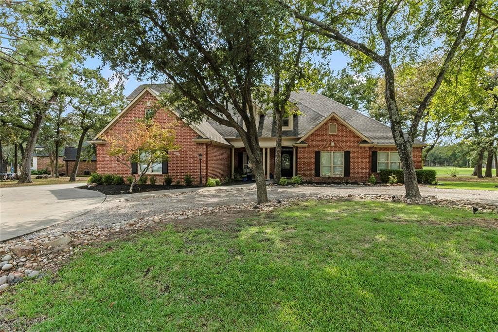 Front of home with circle drive