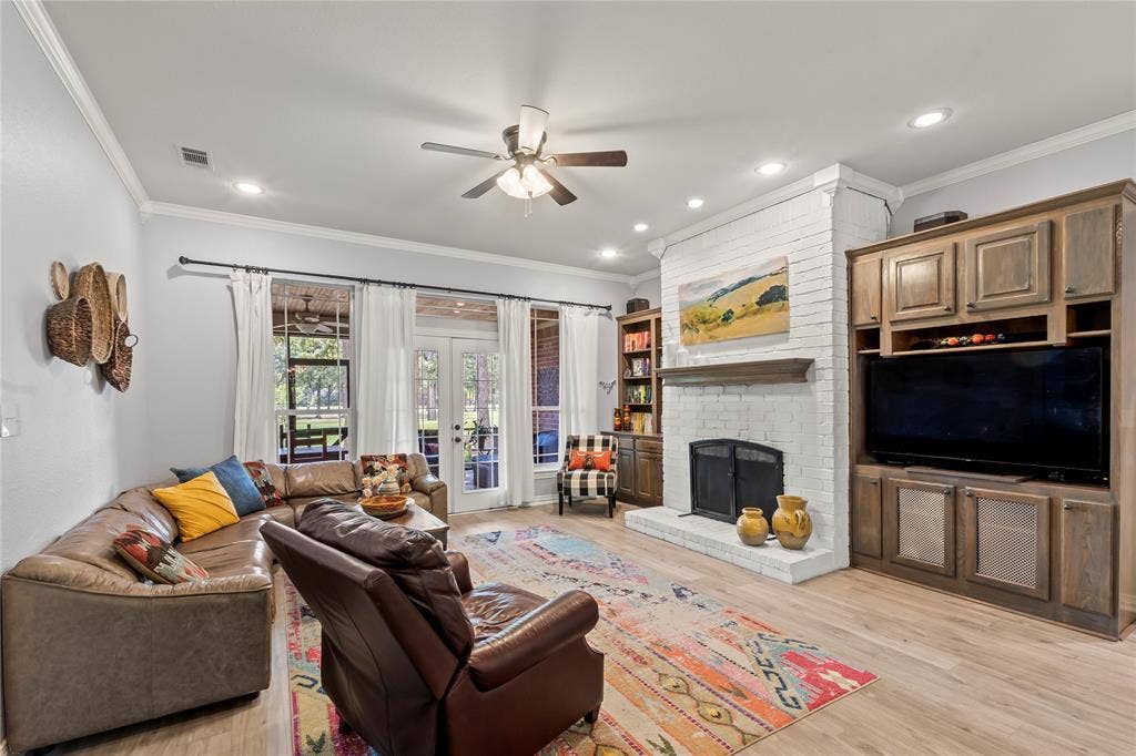 Living room with wood burning fireplace