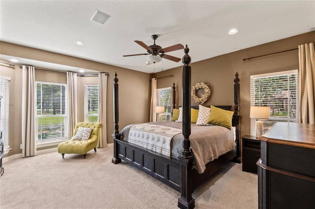 Primary bedroom overlooking golf course
