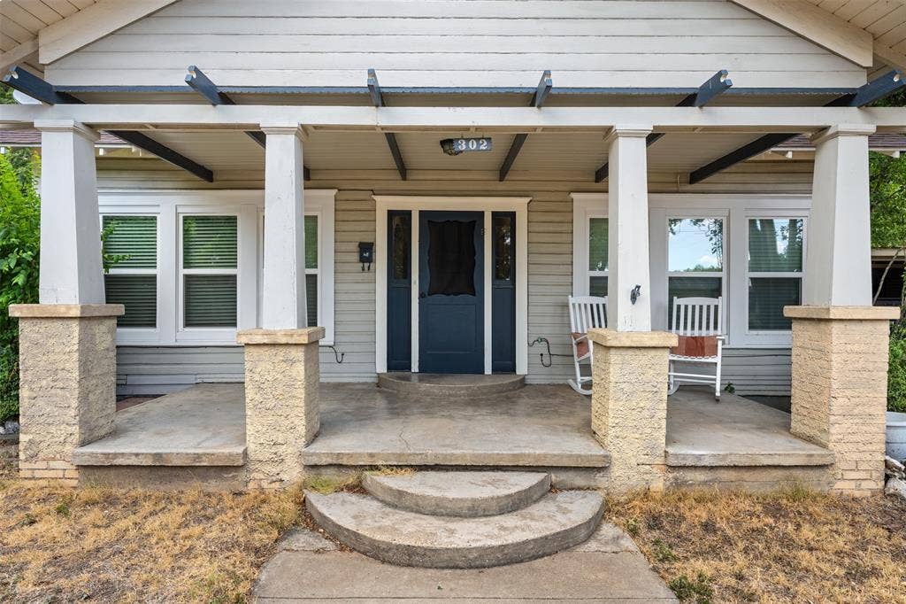 302 W Broadway Street, West, TX 76691 Covered front porch with concrete flooring
