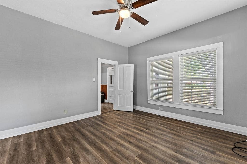 302 W Broadway Street, West, TX 76691 Wood-finish flooring with crisp white trim