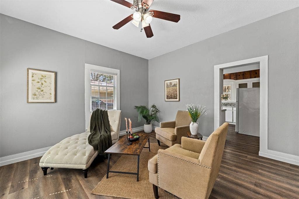 302 W Broadway Street, West, TX 76691 Wood-finish flooring with light gray walls and white trim