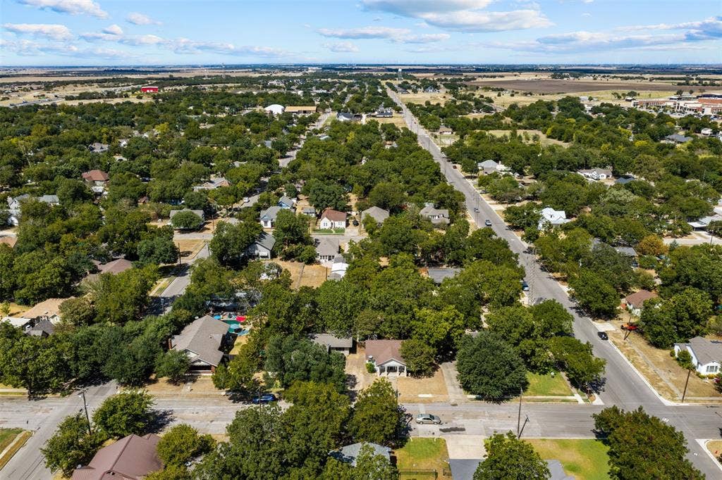 302 W Broadway Street, West, TX 76691 Residential neighborhood with mature tree canopy and paved streets