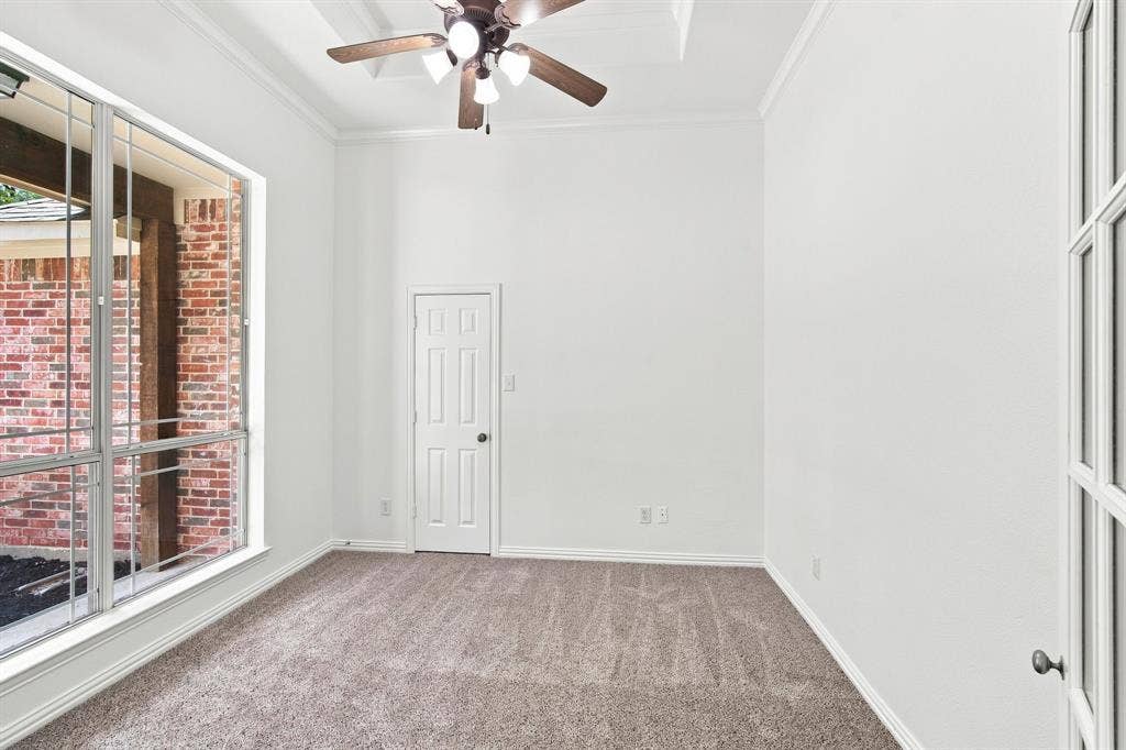 Versatile flex room just off the entry, ideal as a home office, study, or fifth bedroom.