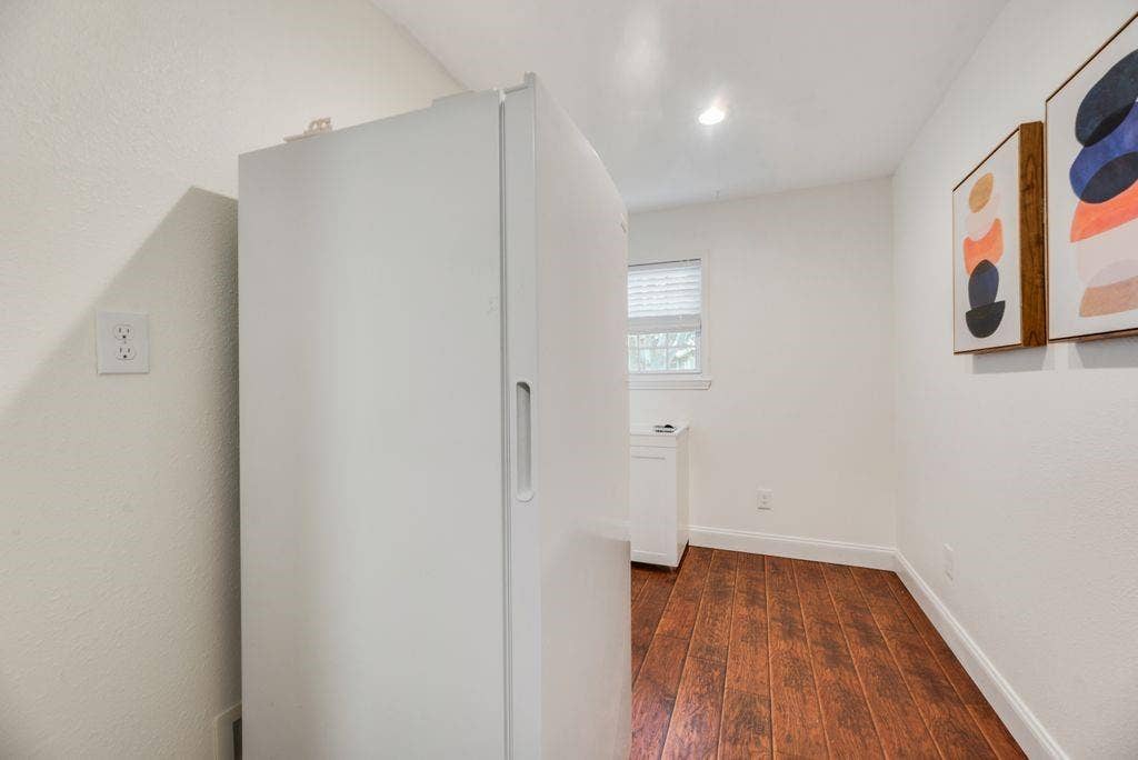 2305 Mccoy Court, Carrollton, TX 75006 Downstair utility room with sink. (Could be converted to 2nd laundry room)