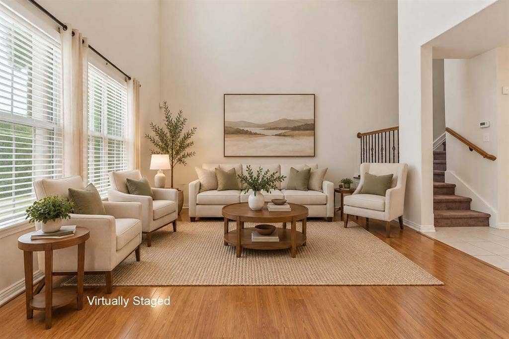 524 S Greenville Avenue, Richardson, TX 75081 Virtually Staged- The living room is flanked on one side by extra large windows that brings in an abundance of natural light.