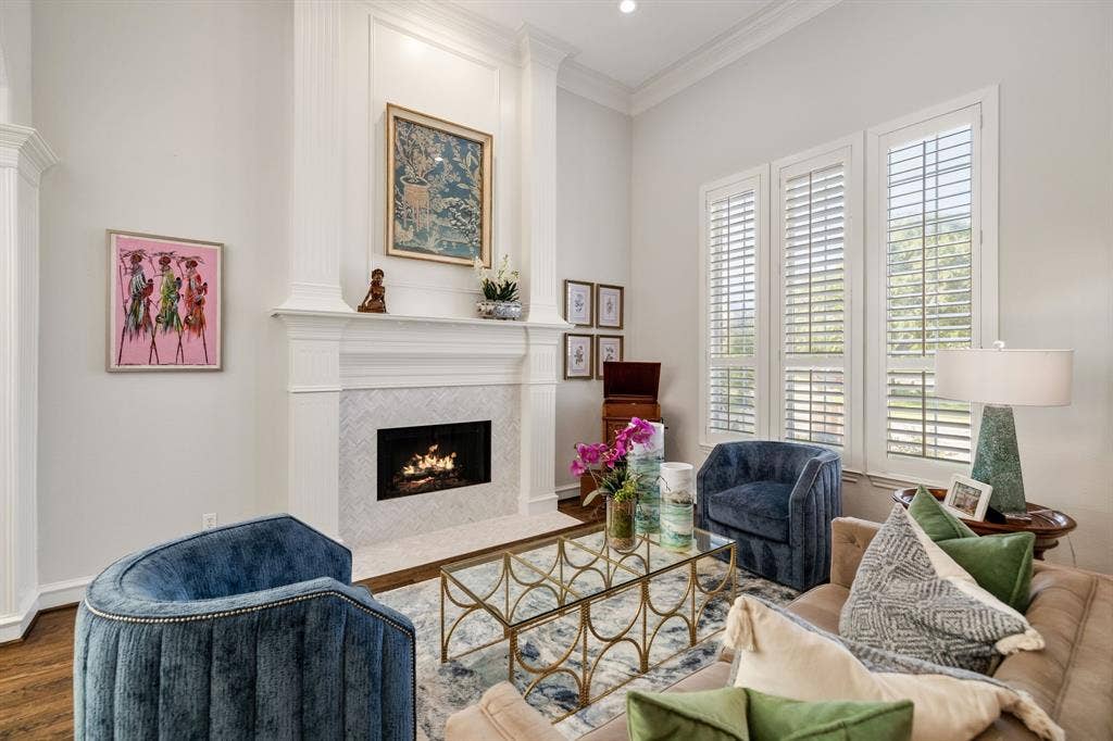 5748 Clarendon Drive, Plano, TX 75093 Harwood flooring, plantation shutters & remodeled fireplace