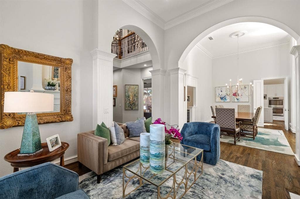 5748 Clarendon Drive, Plano, TX 75093 Beautiful living room flows seamlessly into the formal dining room.