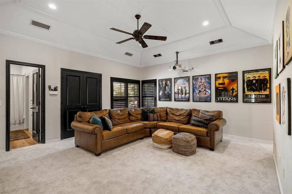 5748 Clarendon Drive, Plano, TX 75093 Spacious media room showcases a projector, built-in speakers & electronic screen to easily hide away when not in use.