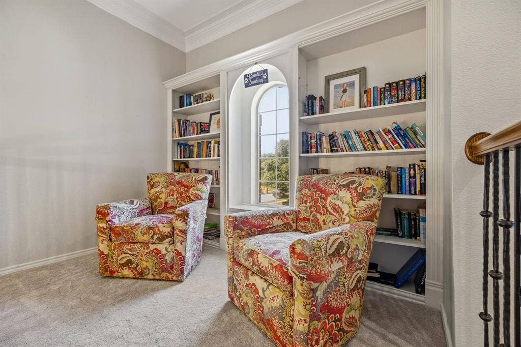 5748 Clarendon Drive, Plano, TX 75093 Upstairs library has built-in bookshelves & overlooks the entry.
