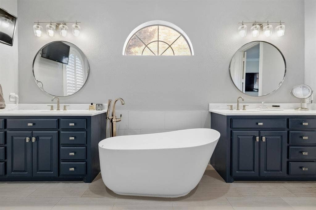 5748 Clarendon Drive, Plano, TX 75093 Magnificent bathroom remodel with free-standing tub & custom cabinetry with dual vanities.