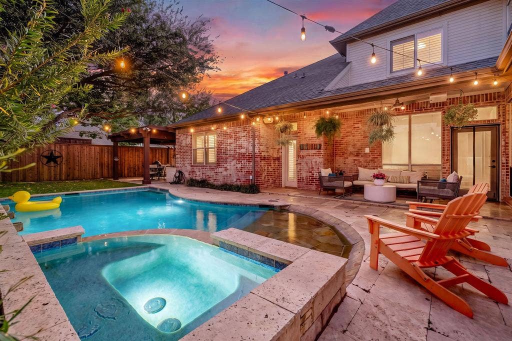 5748 Clarendon Drive, Plano, TX 75093 Sparkling pool with beach-entry & attached spa are the perfect place to lounge.