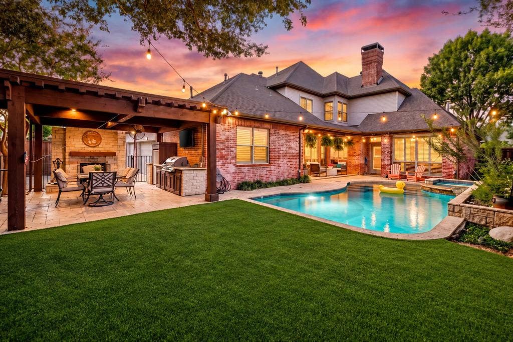 5748 Clarendon Drive, Plano, TX 75093 2026 artificial turf, sparkling pool, covered patio & outdoor living center.