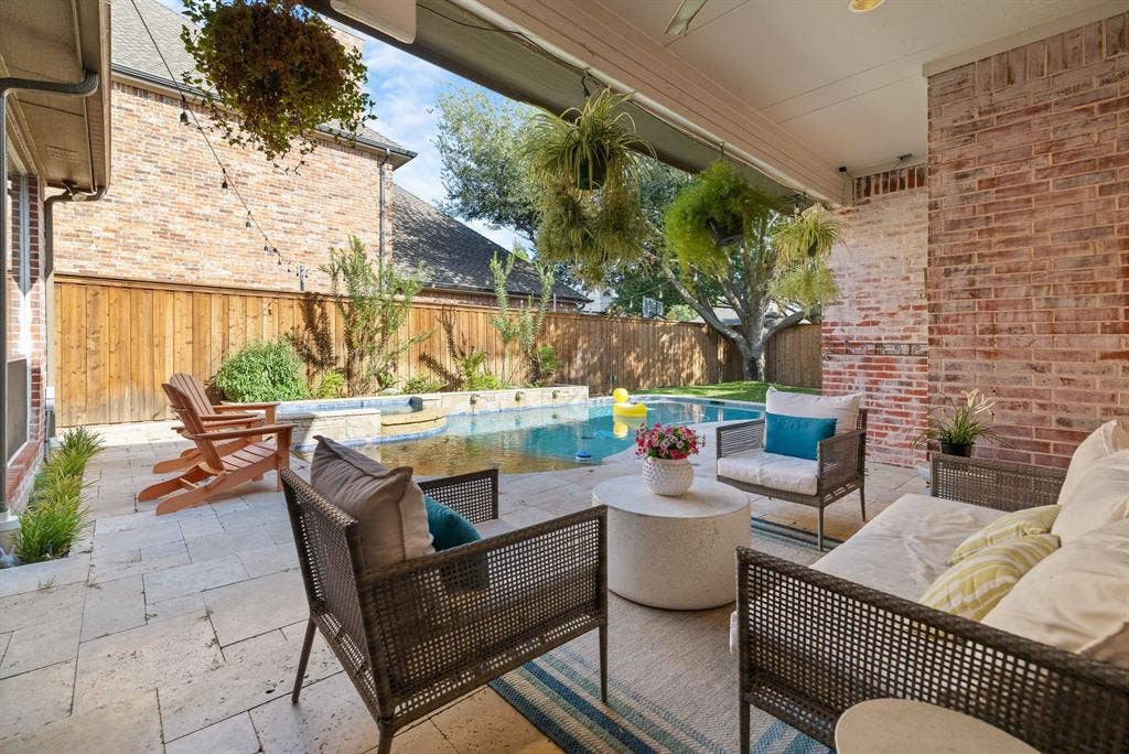 5748 Clarendon Drive, Plano, TX 75093 Unwind on the covered back patio with Bluetooth speakers.