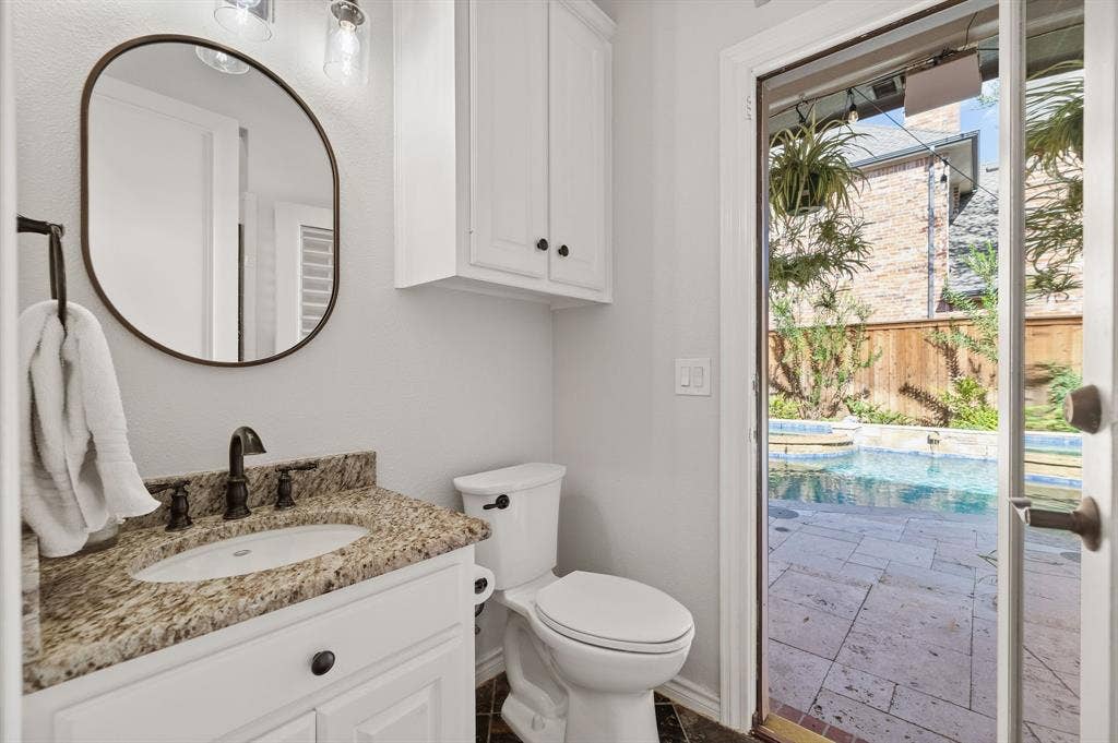 5748 Clarendon Drive, Plano, TX 75093 Full bathroom with a shower, and has separate door for pool access.