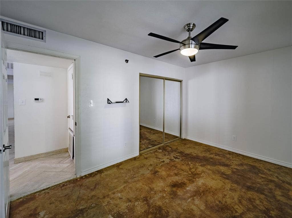 3112 San Jacinto Street, Dallas, TX 75204 downstairs guest bathroom with stained concrete flooring