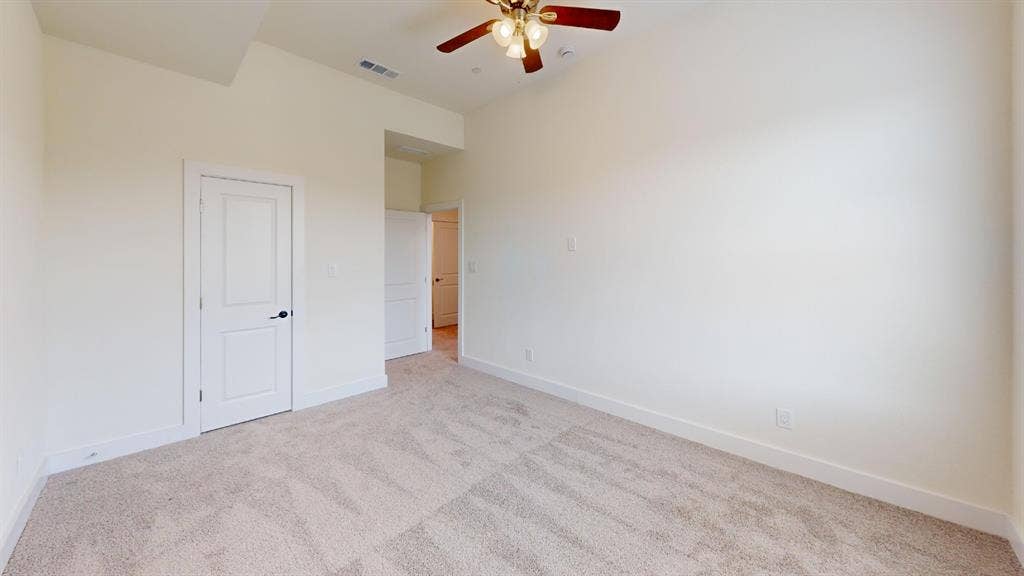 373 Buck Ridge Drive, Frisco, TX 75068 Neutral tone carpet flooring and light-toned walls