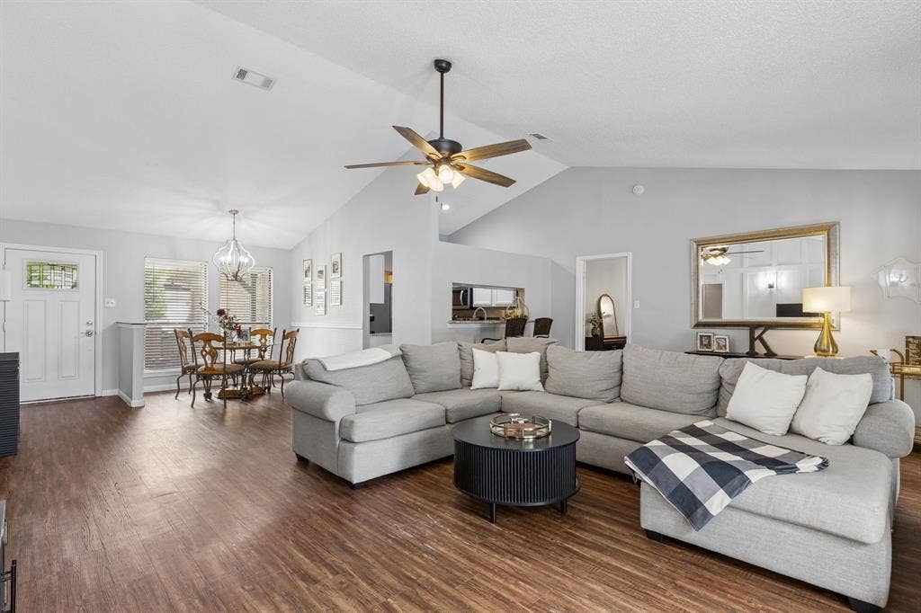 6512 Highview Terrace, Watauga, TX 76148 Living room with view of dining area and kitchen