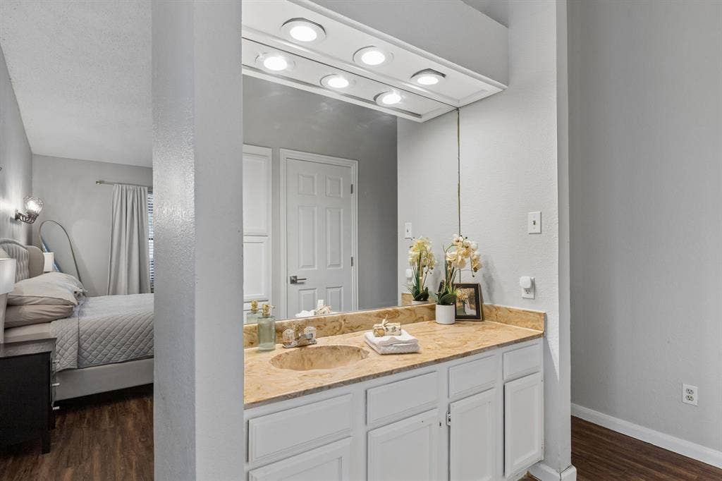 6512 Highview Terrace, Watauga, TX 76148 Primary bathroom vanity with view of primary bedroom