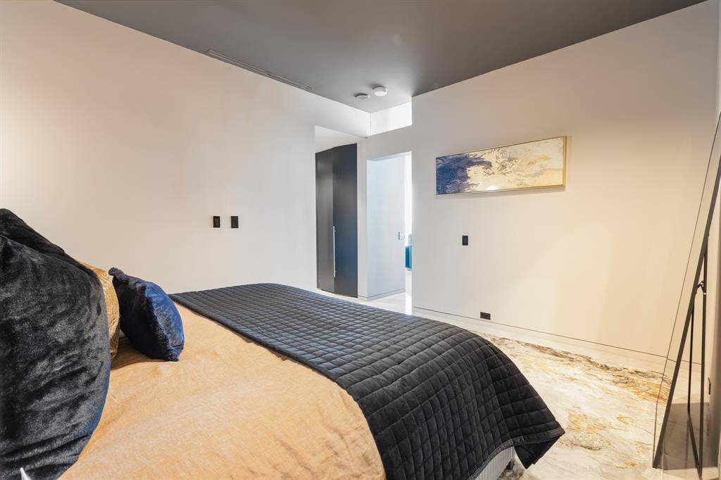 2430 Victory Park Lane, #2401, Dallas, TX 75219 White walls with a dark accent ceiling, recessed lighting, and tile flooring