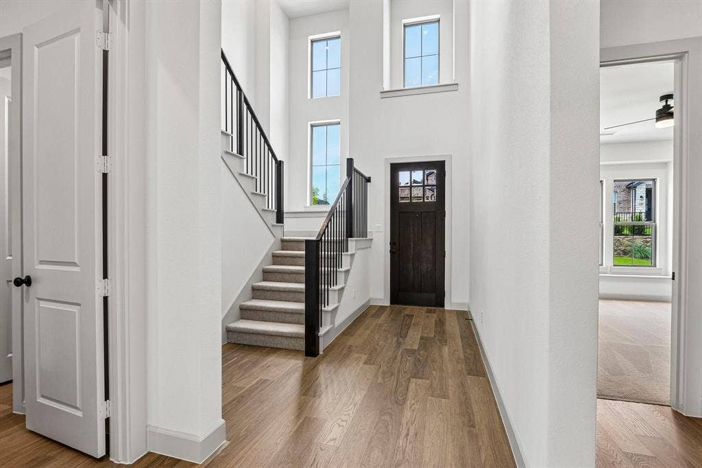 1109 Wheatgrass Mews, Celina, TX 75009 With a dramatic switchback staircase and site lines from the front through to the rear of the home, our Gaston plan is truly your dream home come to life!