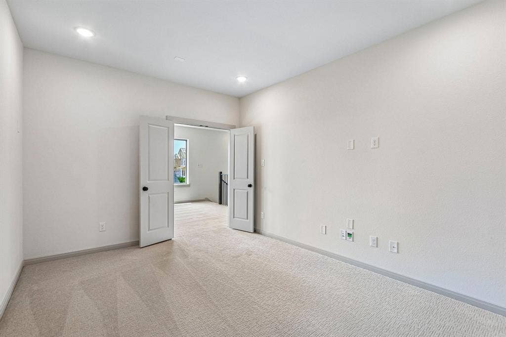 1109 Wheatgrass Mews, Celina, TX 75009 The spacious media room with adjacent game room creates the ultimate family fun zone!