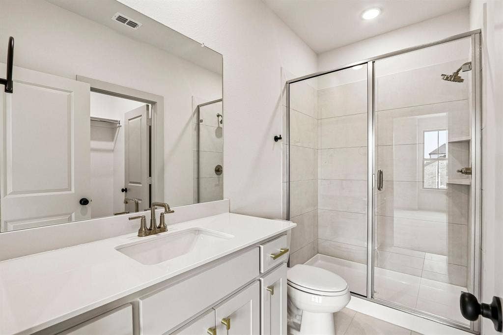 1109 Wheatgrass Mews, Celina, TX 75009 Friends and family will feel right at home in any of the beautifully finished guest baths.