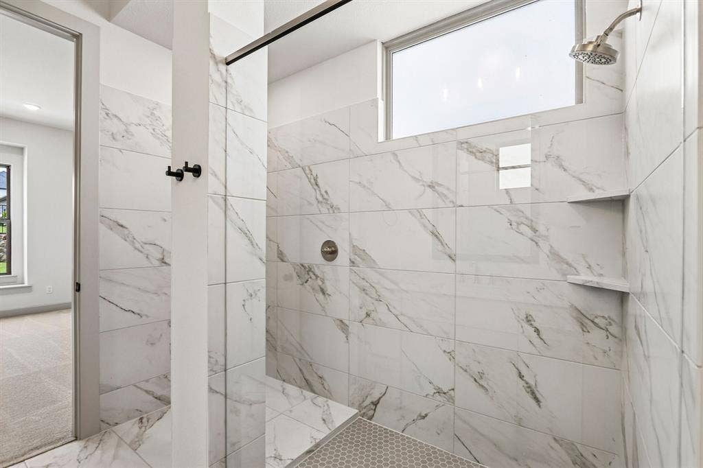 1109 Wheatgrass Mews, Celina, TX 75009 You will never want to leave this spacious walk in shower in your new owner's bath!