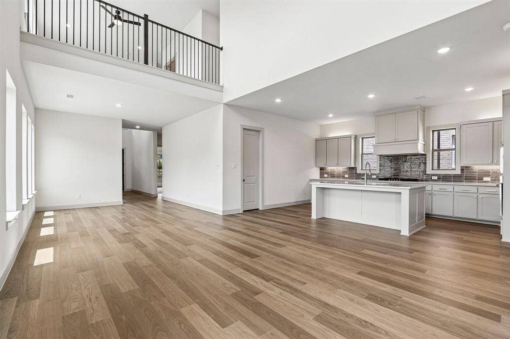 1109 Wheatgrass Mews, Celina, TX 75009 Offering a game room open to the family room below, you'll enjoy a dual level entertainment zone in this dream home.