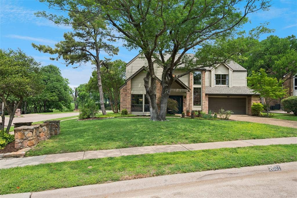 2001 Pebble Beach Court, Richardson, TX 75082 Large retreat on corner lot perfectly positioned with direct view of Sherrill Park's 7th hole.